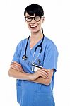 Cheerful Doctor With Stethoscope Around Her Neck Stock Photo