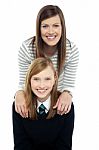 Cheerful Duo Of Adorable Mother And Daughter Stock Photo