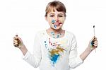 Cheerful Kid With Paint And Brush Stock Photo