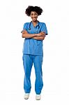 Cheerful Nurse Posing With Arms Crossed Stock Photo