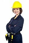 Cheerful Young Worker In Jumpsuit Stock Photo