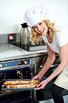 Chef Holding Baguette Stock Photo