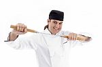 Chef Holding Nunchaku Stock Photo