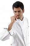 Chef Posing With Hands On Mouth Stock Photo