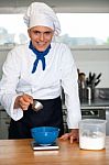 Chef Preparing A Dish Stock Photo