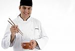 Chef with bowl and chopstick Stock Photo