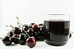 Cherry Juice And Cherries Stock Photo