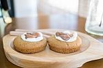 Chocolate And Marshmallow Cookie On Wooden Plate Stock Photo