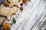 Christmas Gingerbread Cookies On White Table Stock Photo