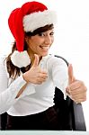 Christmas Lady Showing Thumb Up Stock Photo