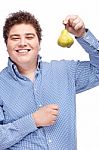 Chubby Man Holding Pear Stock Photo