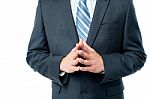 Clasped Hands Of Businessman Stock Photo