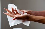 Cleaning Hands With Wet Wipes Stock Photo