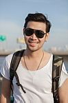 Close Up Face Of Younger Asian Man Wearing Sun Glasses Standing Outdoor Stock Photo