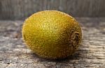 Close Up Fresh Kiwi Fruit On Old Wood Background Stock Photo