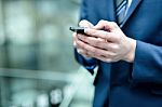 Close Up Of A Man Using Mobile Phone Stock Photo