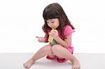 Close-up Of Beautiful Little Girl Drinking From A Juice Box. Sho Stock Photo