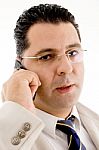 Close Up Of Businessman Busy On Phone Call Stock Photo