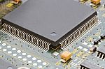 Close Up Of Electronic Circuit Board With Processor Stock Photo