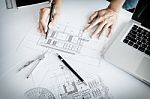 Close-up Of Person's Engineer Hand Drawing Plan On Blue Print Wi Stock Photo