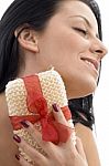 Close Up Of Woman Scrubbing Her Neck Stock Photo