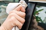 Close Up Of Yellow Chamois (microfiber Towel) On Car Stock Photo