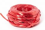 Close Up Red Plastic Rope Top View On White Background Stock Photo