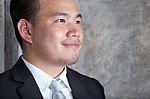 Close Up Skin On Face Of Young Asian Business Man Looking To For Stock Photo