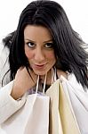 Close View Of Smiling Model With Carry Bags Stock Photo