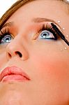 Close View Of Woman Applying Makeup Stock Photo