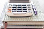 Closeup Calculator, Pen And Notebooks Stock Photo