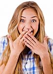 Closeup Of Young Women Covering Her Mouth With Both Hands Stock Photo