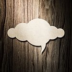 Cloud Paper On Wooden Background Stock Photo