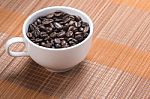 Coffe Bean In Cup Stock Photo