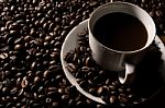 Coffe Beans And Cup Stock Photo