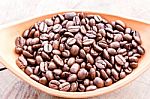 Coffee Bean In Bowl On Grunge Wood Background Stock Photo