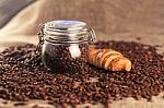 Coffee Beans And Croissant Stock Photo