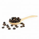 Coffee Beans In Olive Wood Spoon Stock Photo