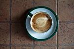 Coffee Cup On Ceramic Table Stock Photo