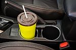 Coffee Or Tea Mugs Green Placed On The Vehicle Console In Modern Luxury Car Interior Stock Photo