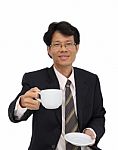 Coffee Serving From Business Man Focus At Cup On White Background Stock Photo