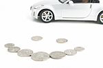 Coins On White With Car Stock Photo