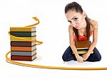 College Girl With Books On Her Laps Stock Photo