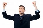 Confident Businessman Celebrating His Success Stock Photo