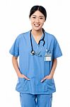 Confident Female Doctor In Medical Uniform Stock Photo