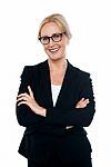 Confident Female Executive Wearing Eyeglasses Stock Photo