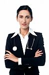 Confident Looking Lady Doctor, Arms Crossed Stock Photo