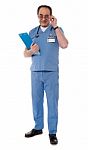 Confident Senior Doctor With File Stock Photo