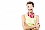 Confident Woman With Headphones Stock Photo