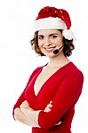 Confident Young Female Santa Stock Photo